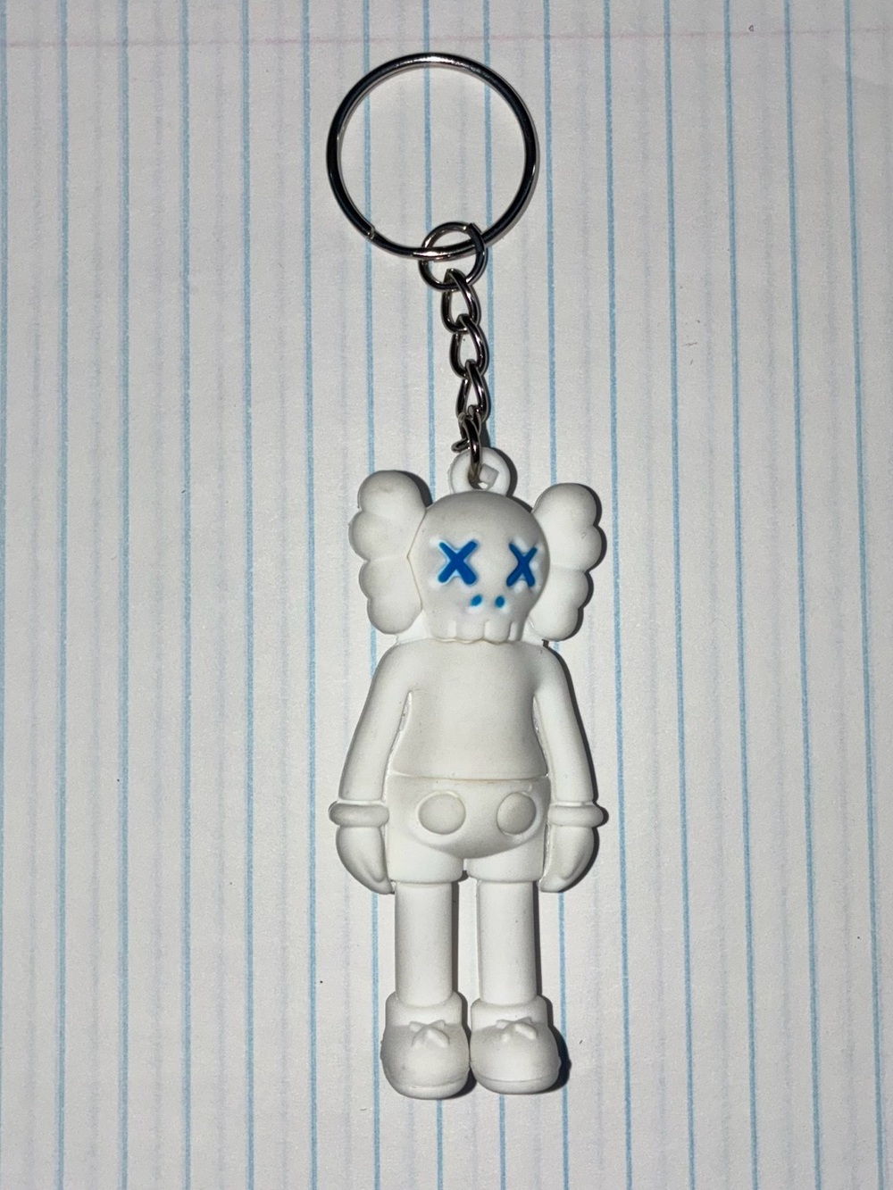 KAWS White Figure Keychain with Blue Eye Accents